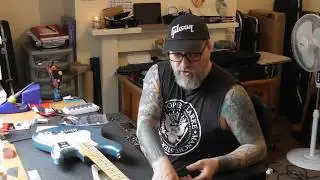 Fender Player Series Strat in for upgrades and an overhaul...