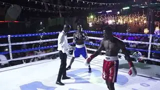 BOXING - STANLEY MUGERWA HUMILIATES TOM MUWANGUZI
