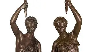 An Important Pair of Monumental Parcel-Gilt and Patinated Bronze Figural Torch&egrave;res