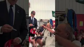 Biden SWAPS caps with TRUMP supporter!