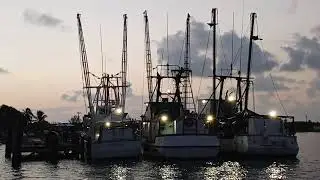 MAILBOAT DOCKING AT MOORES ISLAND ABACO....