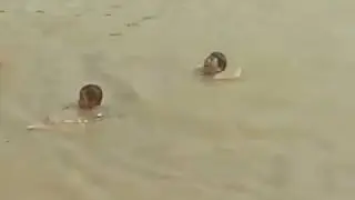 Gente ba&ntilde;&aacute;ndose en R&iacute;o Tocuyo 2018
