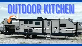 Amazing outdoor kitchen on this travel trailer! Don&rsquo;t miss it! Camper Tours