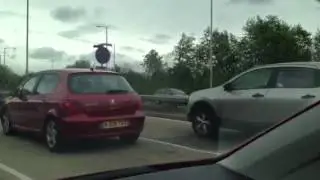 Woman reversing up a404 slip road back onto roundabout