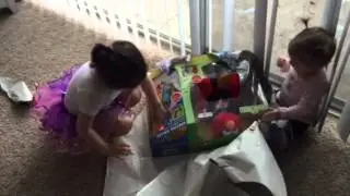 Sophia opening elmo present