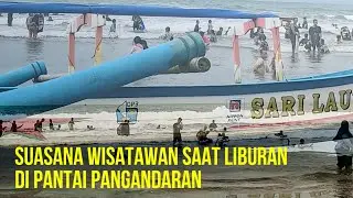 Liburan Seru Wisatawan Di Pantai Pangandaran,Begini Suasananya Pengunjung