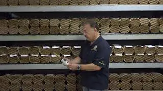 Nick Perdomo Checks the Humidity Level of the Cigars in The Aging Room Before Color Sorting