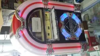 Demonstra&ccedil;&atilde;o do Jukebox Crosley CR1101A CD Radio LED Cherry