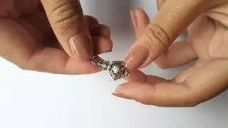 Sterling silver, Blue topaz cabochon, Harmony ball pendant