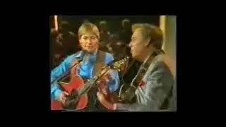 John Denver sings 