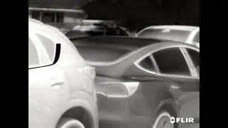 Cars on a parking lot in thermal vision
