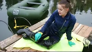 Jeans girl in waders and neon rain coat