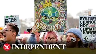 Live: Extinction Rebellion target banks in London protest