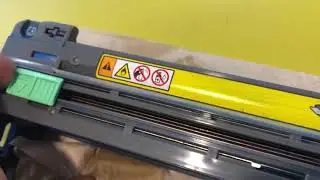 Ошибка сдвига зеленой вкладки на барабане в принтерах Brother