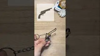Tiny Revolver: Big Charm in Golden and Black | Artistic Wire Art