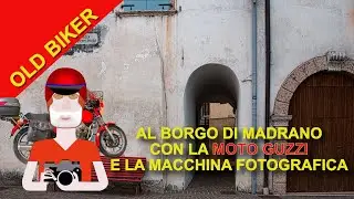 Al borgo di Madrano con la moto Guzzi e la macchina fotografica