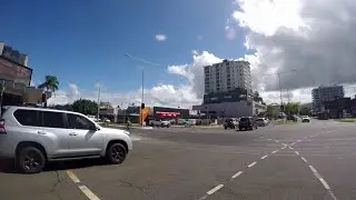 Sunday in Cairns in search of cheap gin and cockroach killing insect spray
