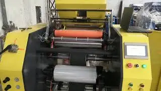How stretch film rewinder working with high speed and autoamtic roll change
