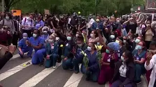 NY nurses take a knee in solidarity with protesters