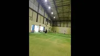 Playing tennis indoor court with Rayban Meta Smart Glasses, slice? flat? serve