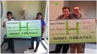 Happy Clients Receiving Rebate Check