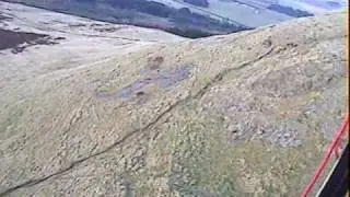 Paragliding in strong conditions at East Lomond, Fife, Scotland