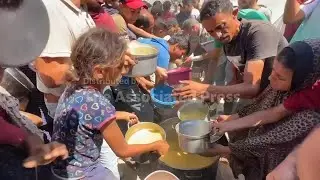 Desperate Palestinians crowd to get share of limited food at Gaza soup kitchen