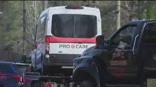 Driver of medical transport van turns himself in after 2 killed in crash with SUV