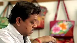 The History and Creation of Anuschka Hand Painted Handbags