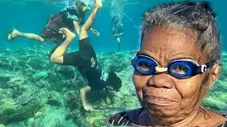 Women Spear Fishing For Survival in Timor Leste (East Timor)