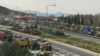 Greek farmers block roads in protest against reforms