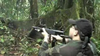 9 mm Model HM-3 Mendoza submachine gun with red dot sight.