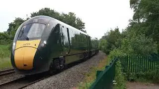 TWO TRAINS: Two passenger trains pass on Wellington Bank, near Whiteball Tunnel