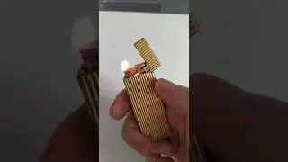 Dunhill Rollagas gold plated with vertical lines texture gas lightet from the 80's
