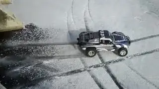 Stock Traxxas Slash on Frozen Pond (Monster Rear Wheels)