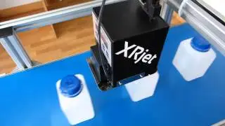 Industriedrucker XRjet Kennzeichnung von Deckeln