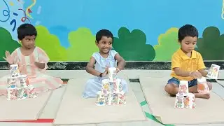 Gross motor activity.paper cup pyramid by junior kg students