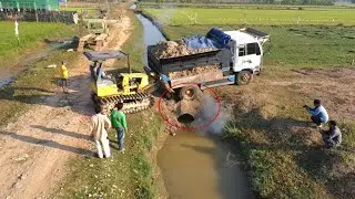 Unbelievable!! Dump truck drive Crossing small Canal Stuck Recovery by a Talented drive dozer