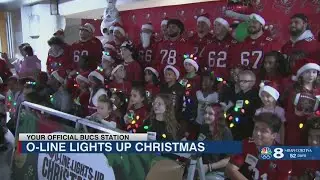 Bucs offensive line shops for Christmas presents with underprivileged kids