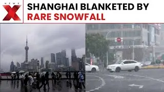 Cold Wave Brings Rare Snowfall To Shanghai As City Experiences Unusual Winter Chill