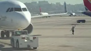 Funny Dancing Airport Marshaller at San Diego International Airport