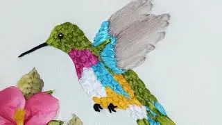 Hummingbird with ribbon.