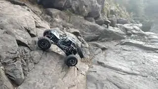Slow motion video Axial Bomber rc crawler steep rock climbing!