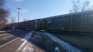 caleb and daddy saw a train at savage road with Norfolk southern Millepost
