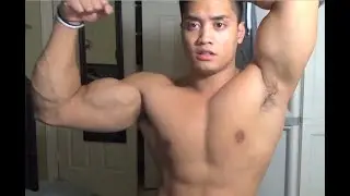 Buff Latino pumping up his Big Biceps
