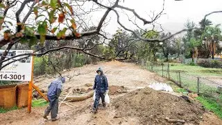 Atmospheric river hits Southern California with risks of flash floods in fire-ravaged areas, coast