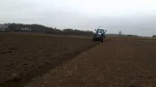 New Holland TM 125 i kverneland em 100