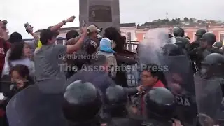 Clashes erupt during anti-government protest in Ecuador