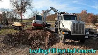 Loading Fill Dirt And Concrete And Starting The Rough Grade