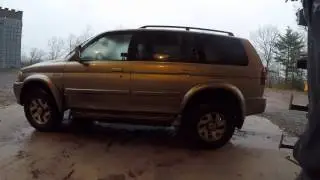 Installing air helper springs in a Mitsubishi Montero SUV